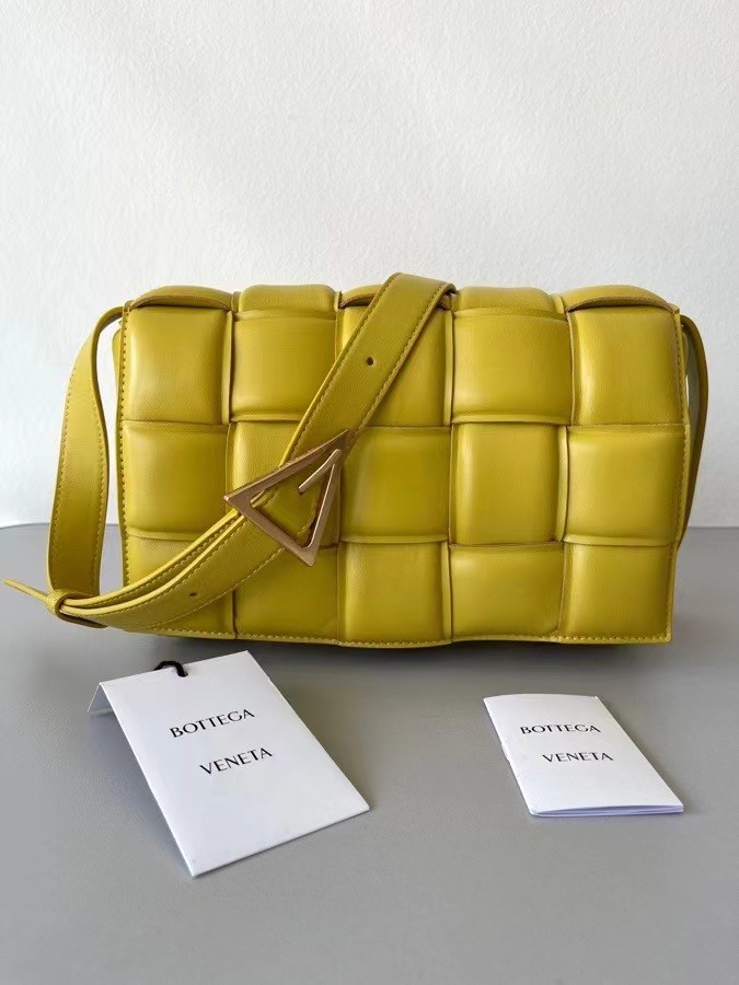 bo*te*ga Ve*ne*ta padded cassette bag in yellow lambskin