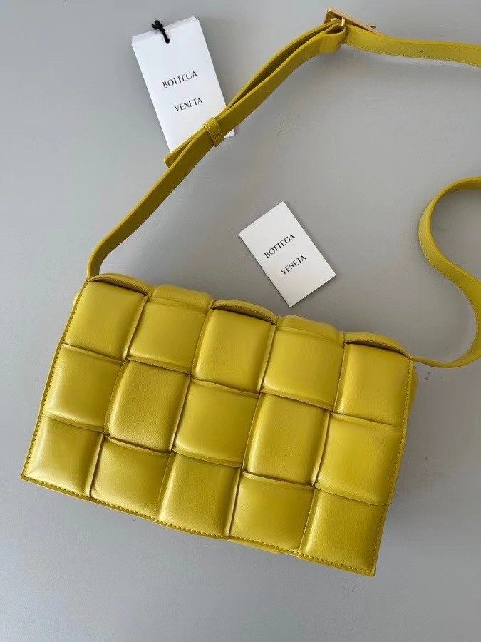 bo*te*ga Ve*ne*ta padded cassette bag in yellow lambskin