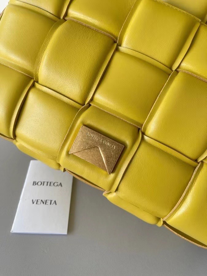 bo*te*ga Ve*ne*ta padded cassette bag in yellow lambskin