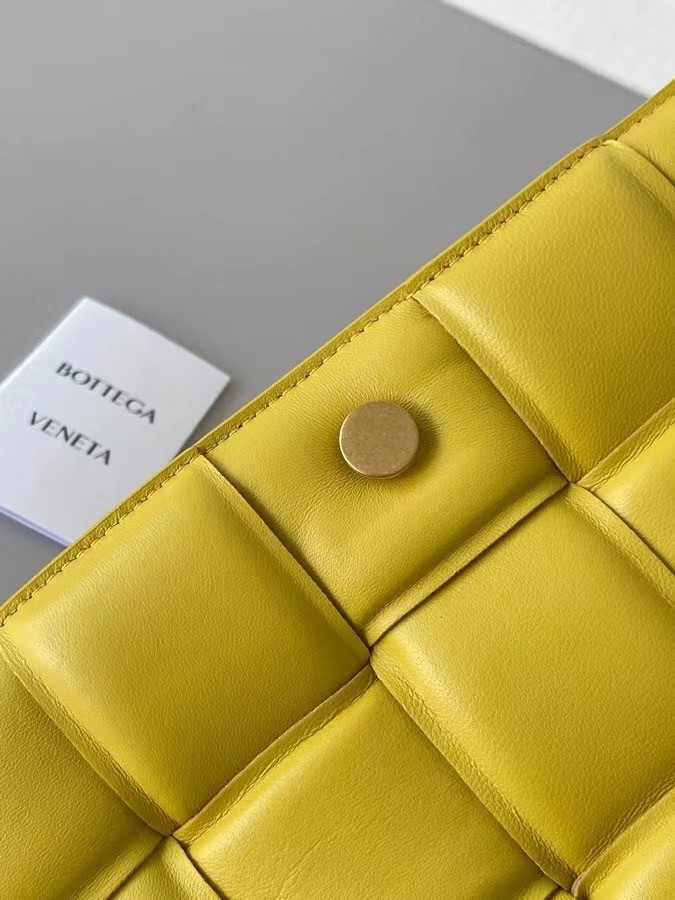 bo*te*ga Ve*ne*ta padded cassette bag in yellow lambskin