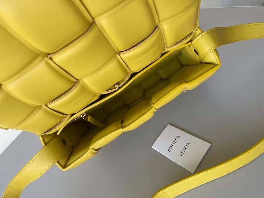 bo*te*ga Ve*ne*ta padded cassette bag in yellow lambskin