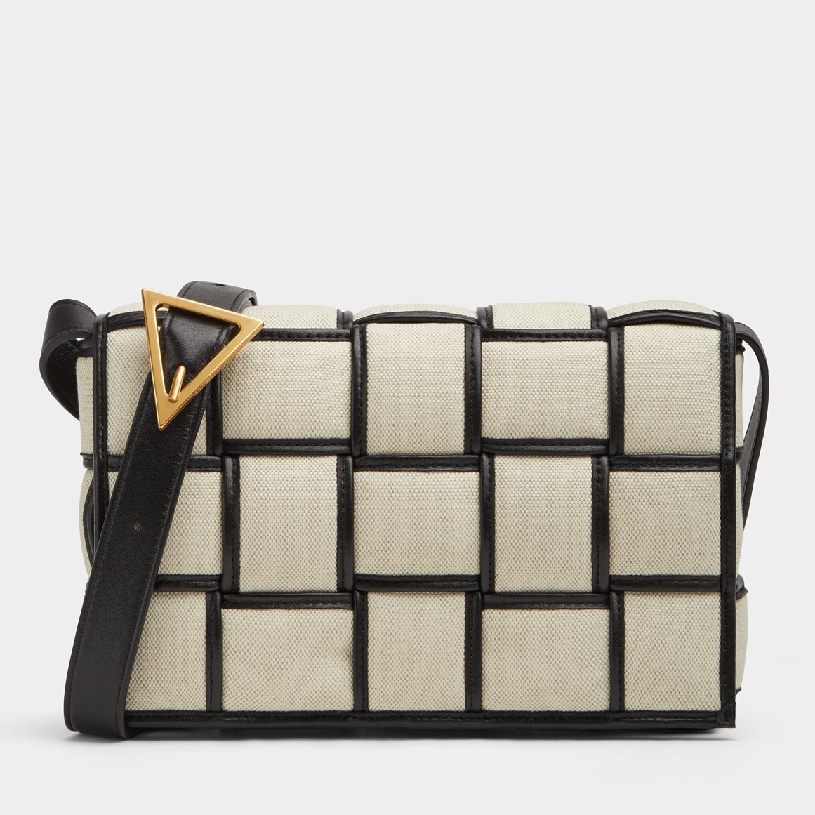 bo*te*ga Ve*ne*ta padded cassette bag in natural canvas