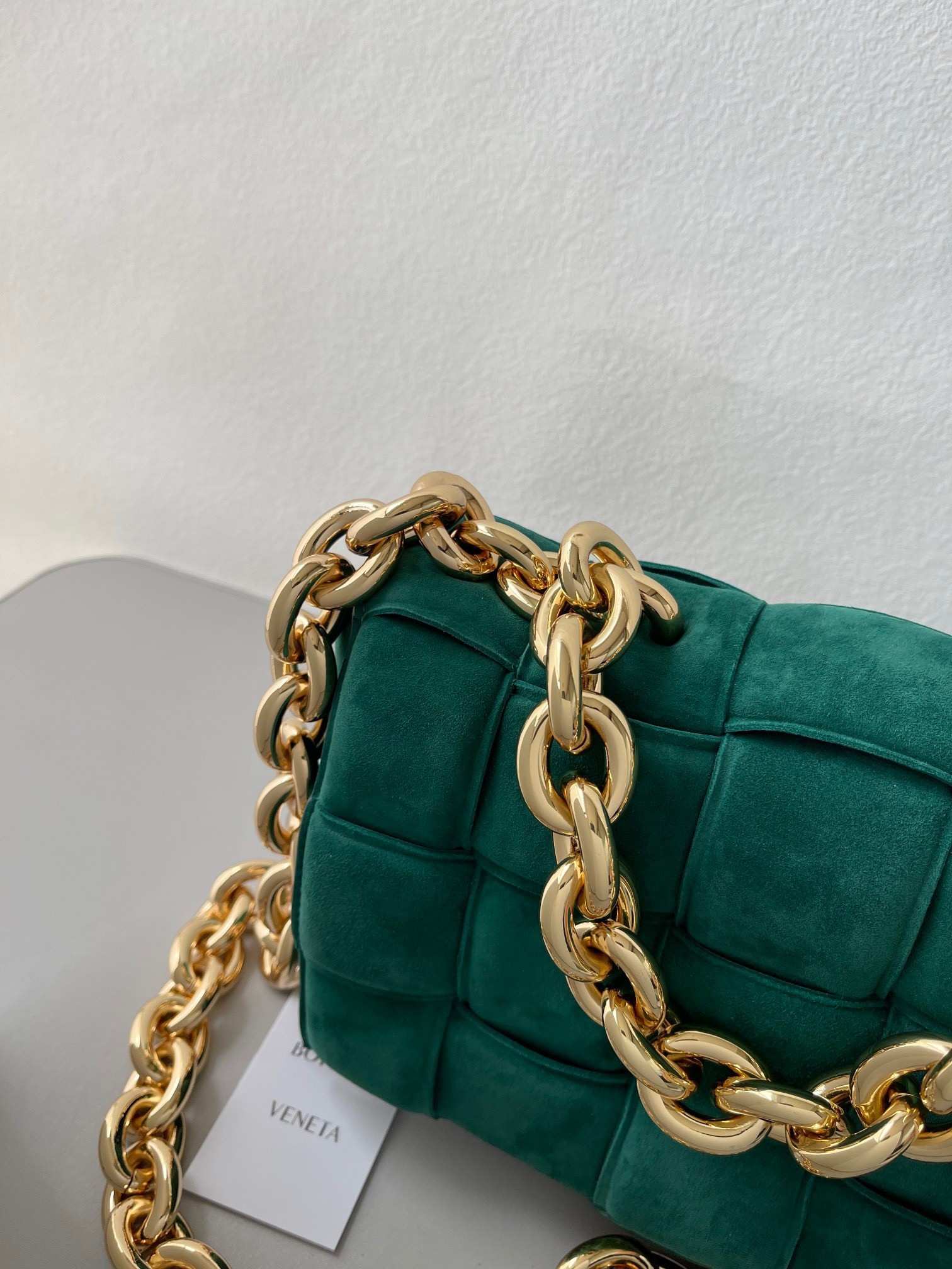 bo*te*ga Ve*ne*ta chain cassette bag in emerald green suede