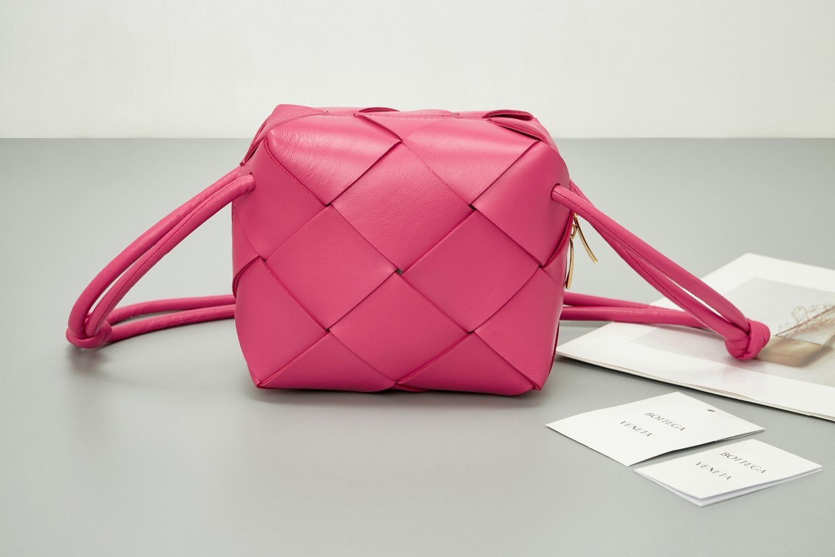 bo*te*ga Ve*ne*ta mini cassette camera bag in cranberry lambskin