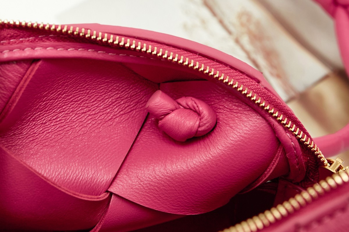 bo*te*ga Ve*ne*ta mini cassette camera bag in cranberry lambskin
