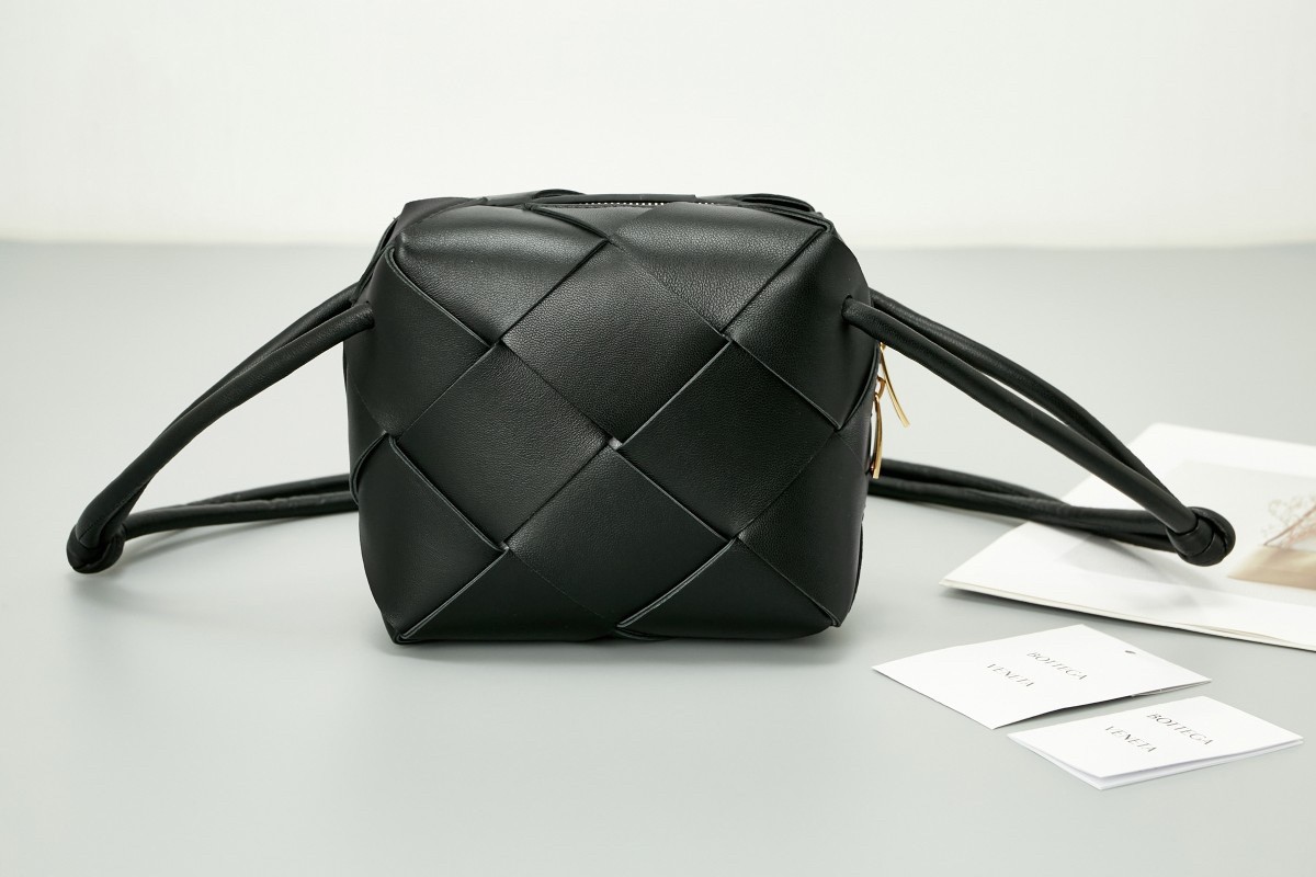 bo*te*ga Ve*ne*ta mini cassette camera bag in black lambskin