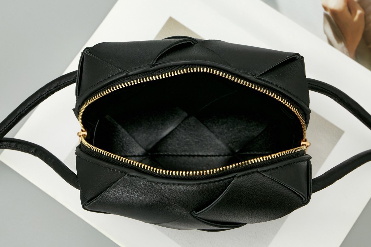 bo*te*ga Ve*ne*ta mini cassette camera bag in black lambskin