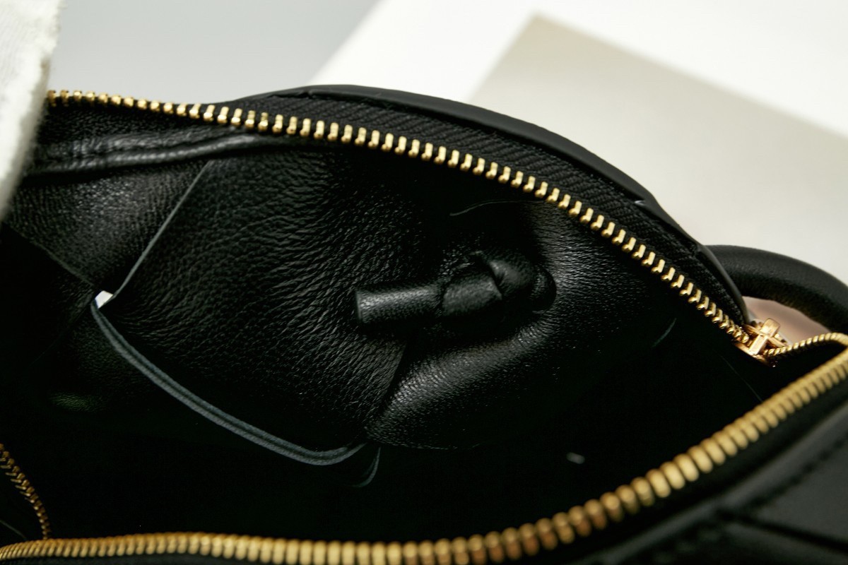 bo*te*ga Ve*ne*ta mini cassette camera bag in black lambskin