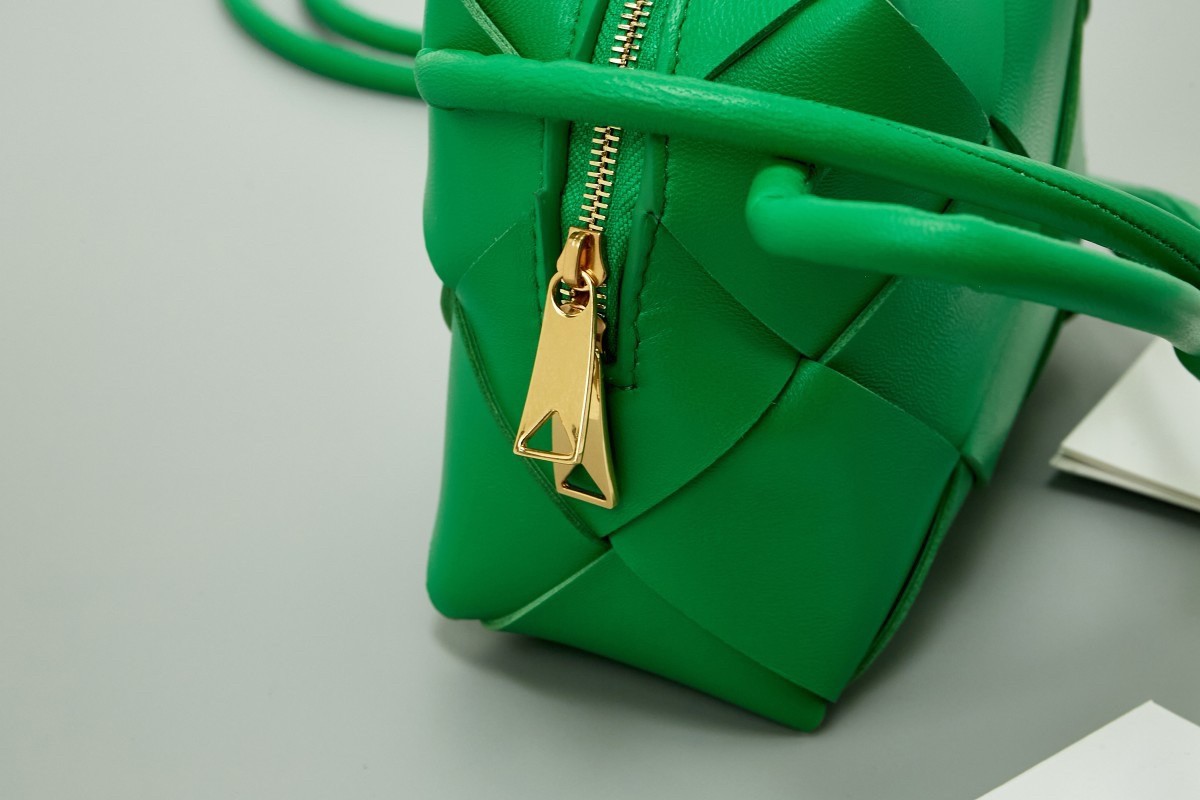 bo*te*ga Ve*ne*ta mini cassette camera bag in parakeet lambskin