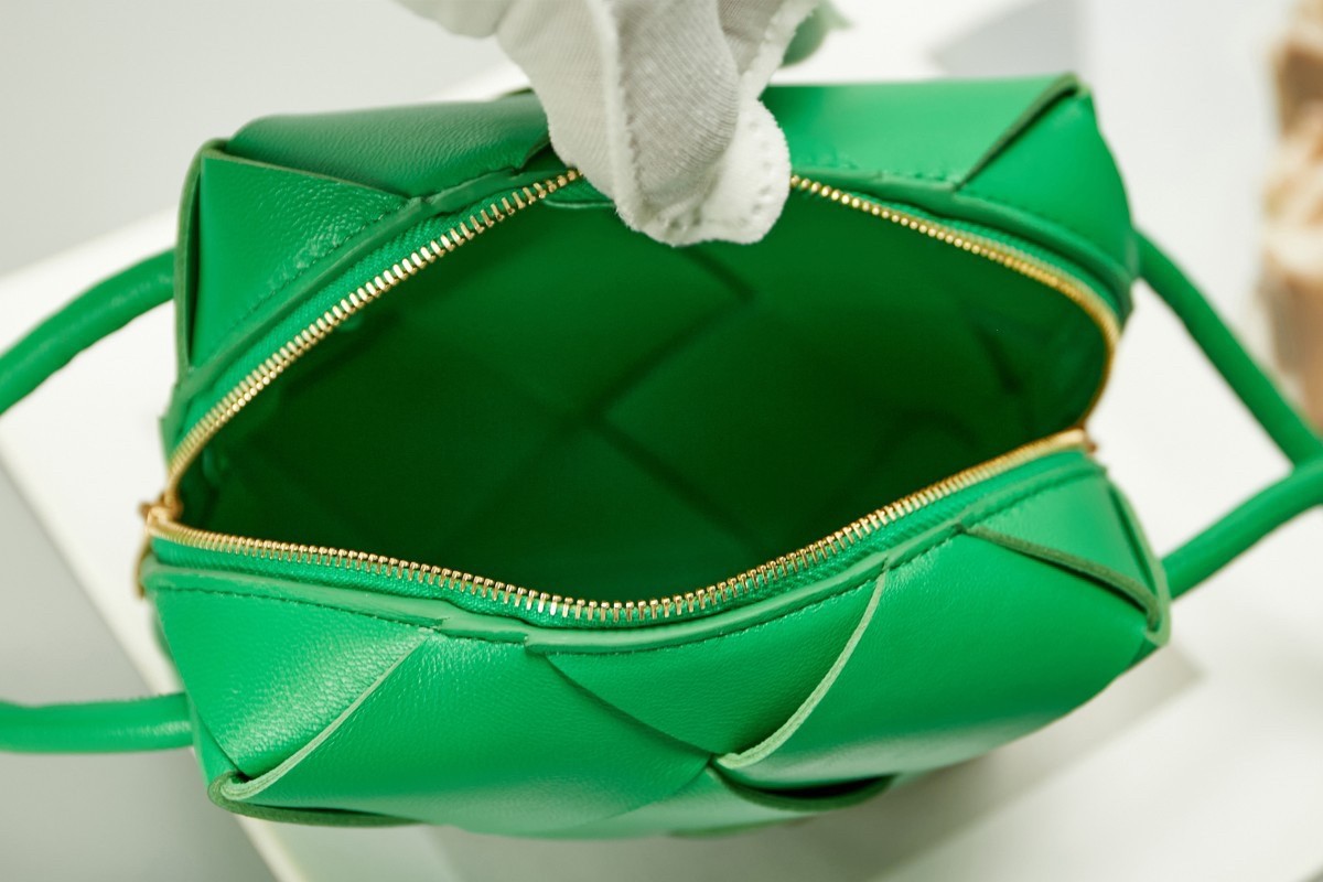 bo*te*ga Ve*ne*ta mini cassette camera bag in parakeet lambskin