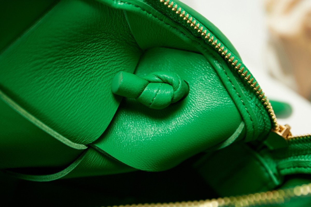 bo*te*ga Ve*ne*ta mini cassette camera bag in parakeet lambskin