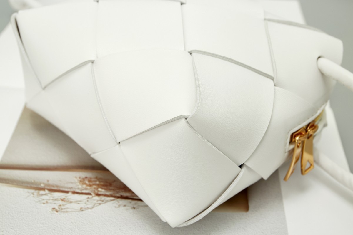 bo*te*ga Ve*ne*ta mini cassette camera bag in white lambskin