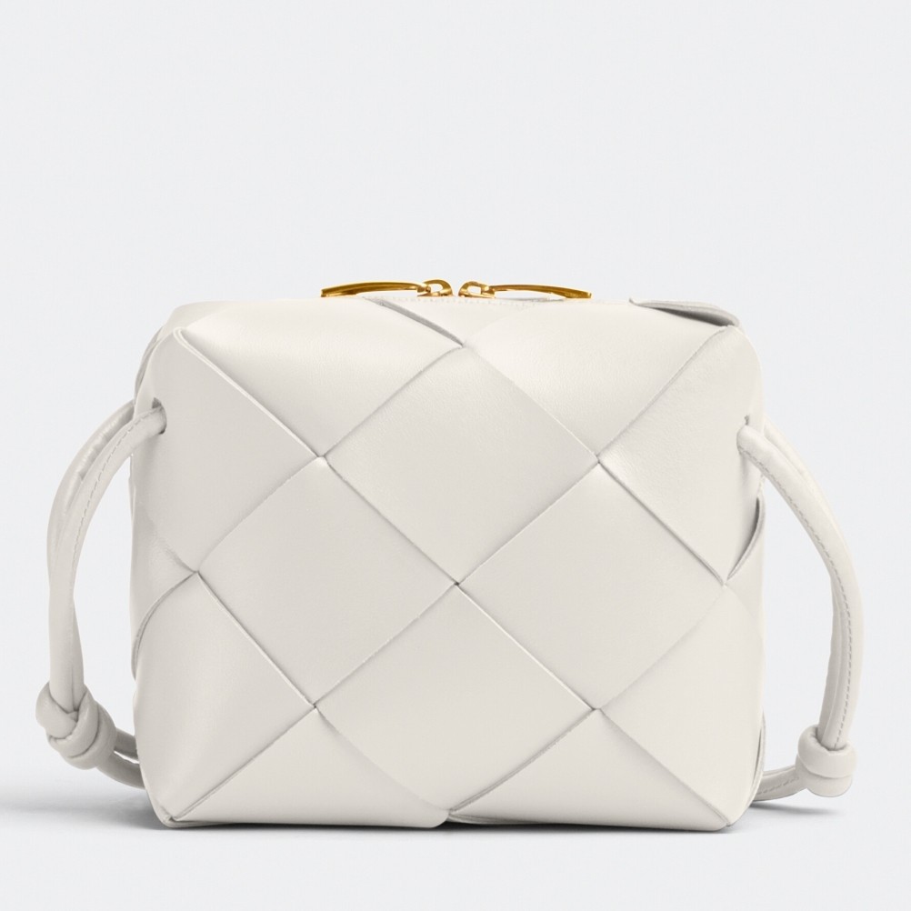 bo*te*ga Ve*ne*ta mini cassette camera bag in white lambskin