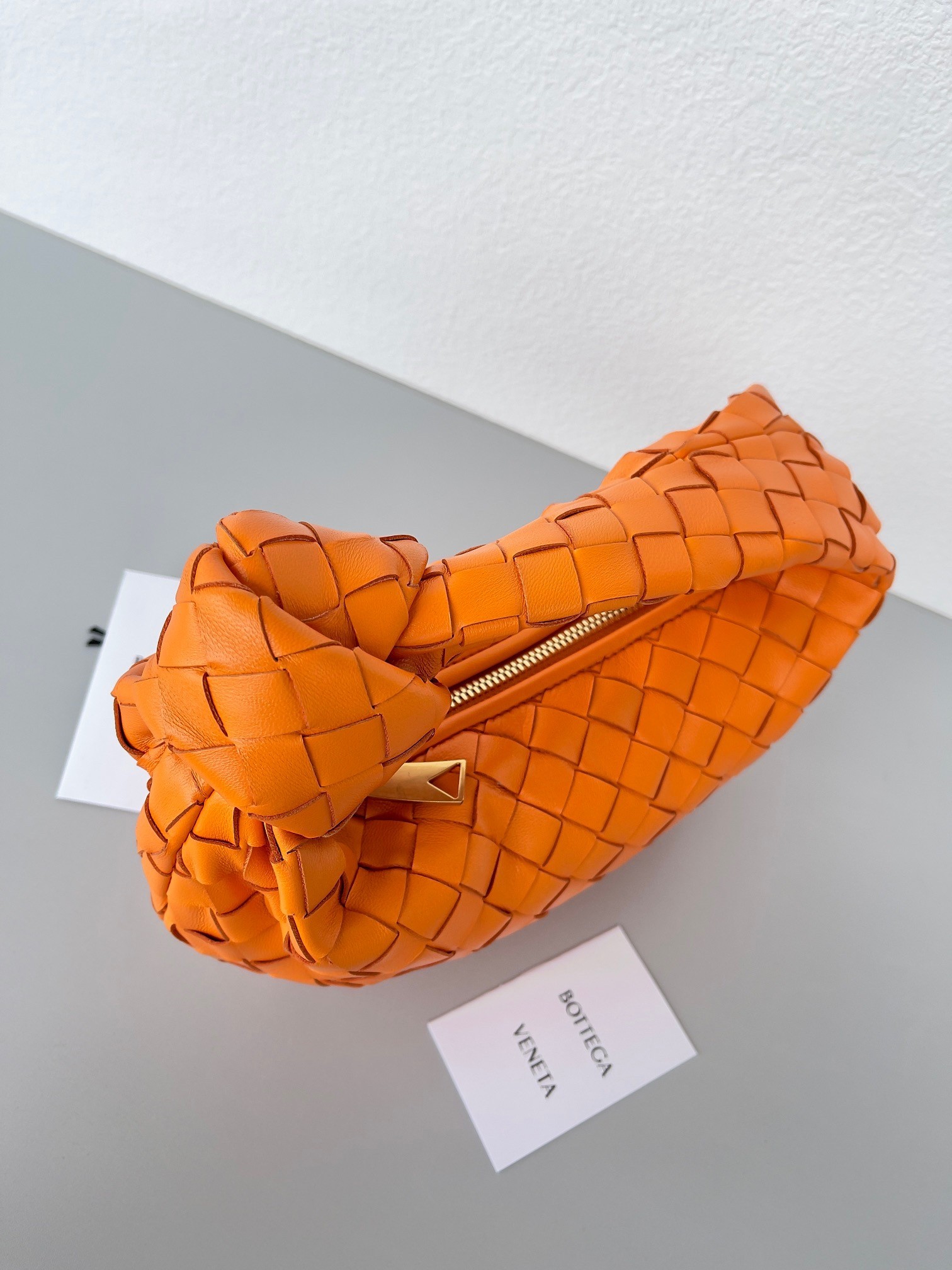bo*te*ga Ve*ne*ta bv jodie mini bag in orange intrecciato lambskin
