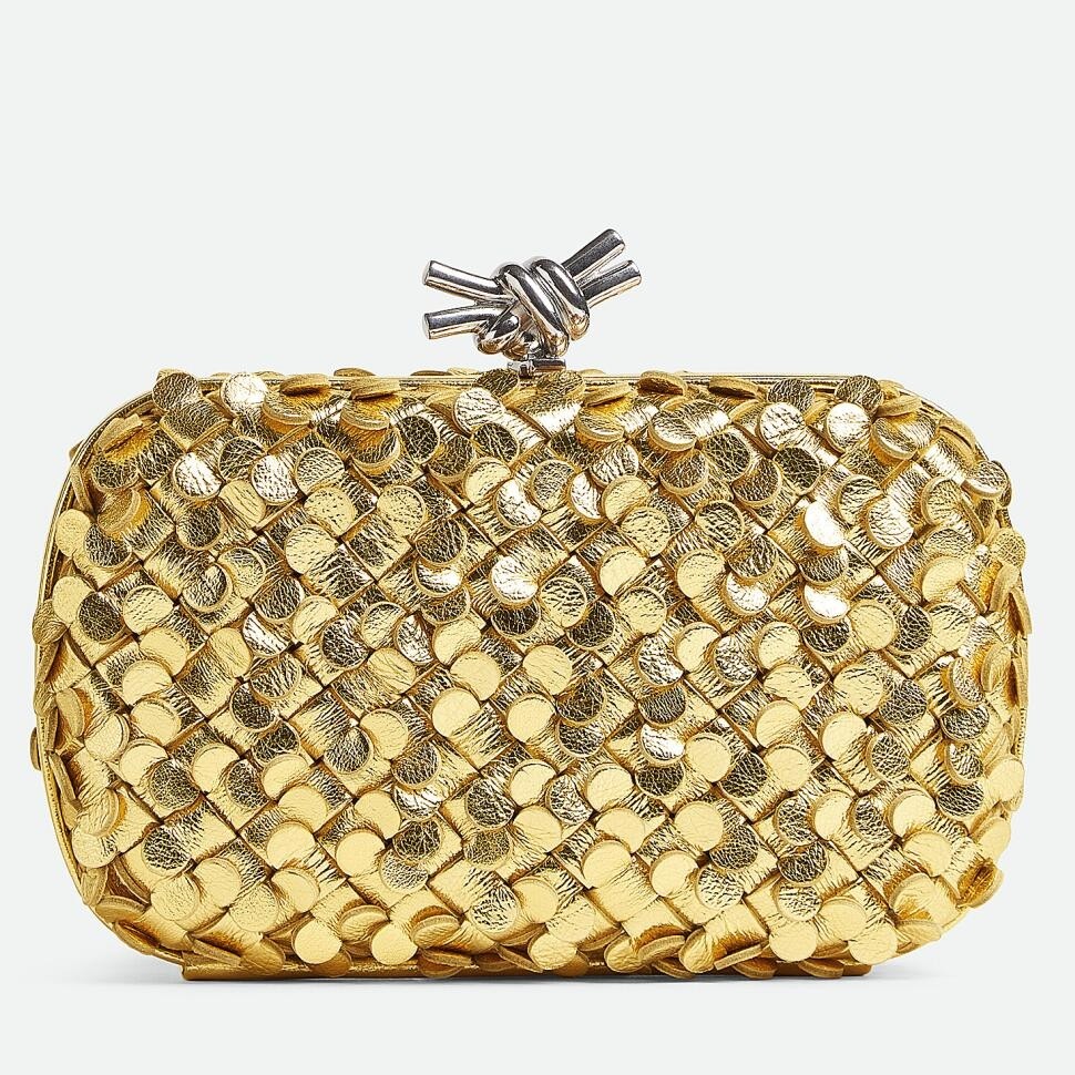 bo*te*ga Ve*ne*ta knot minaudiere clutch in gold sequins laminated leather