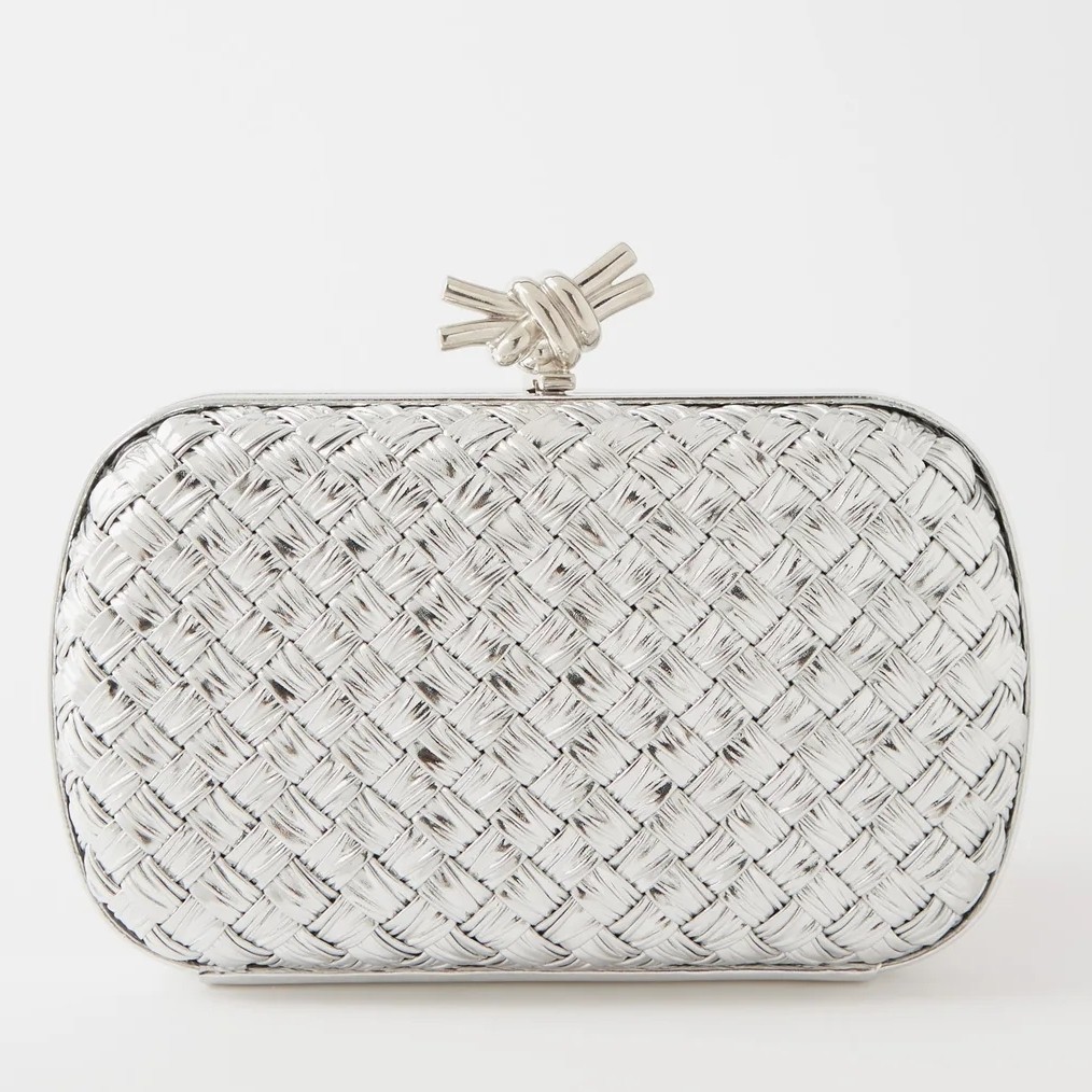 bo*te*ga Ve*ne*ta knot minaudiere clutch in silver intreccio laminated leather