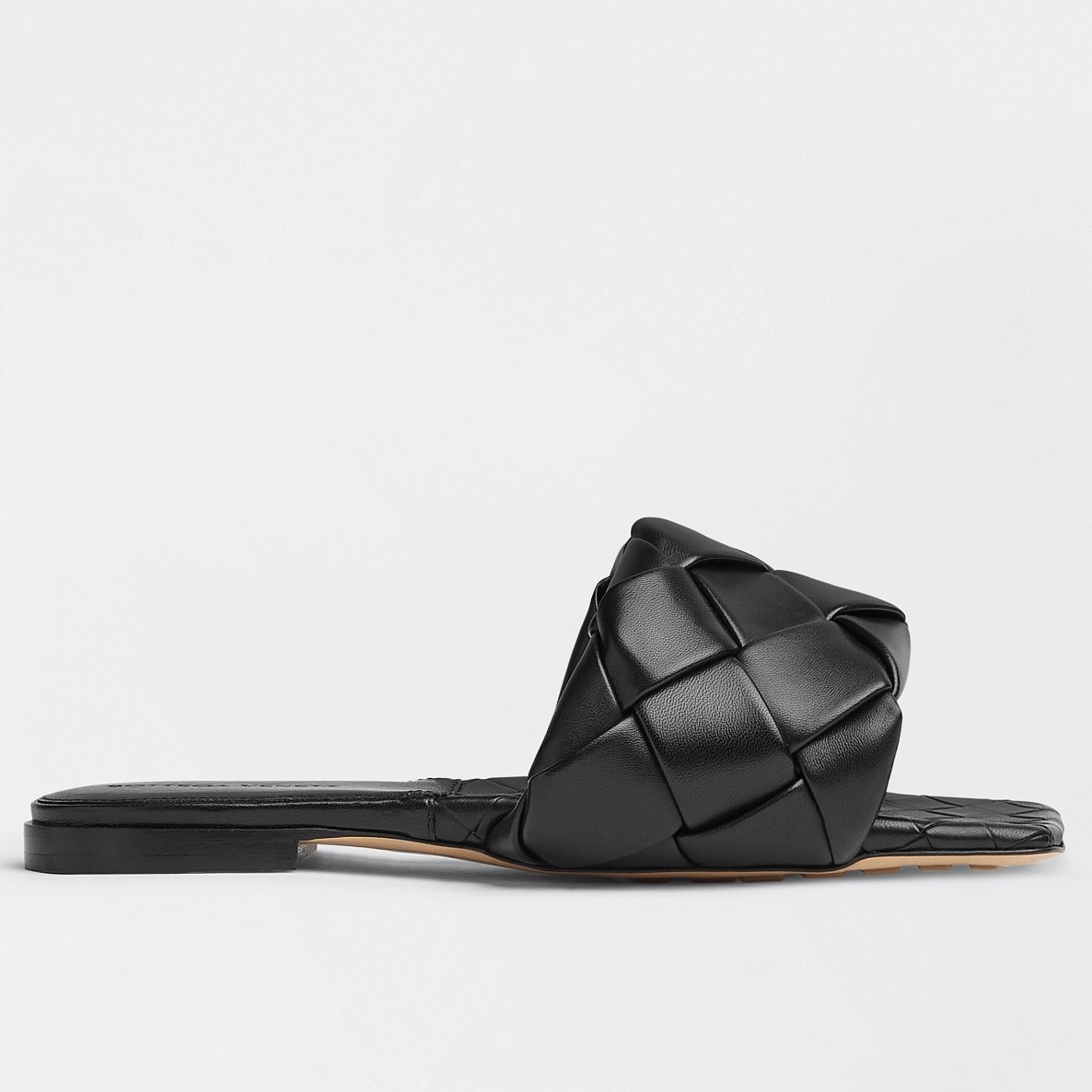 bo*te*ga Ve*ne*ta lido slides in black intreccio lambskin
