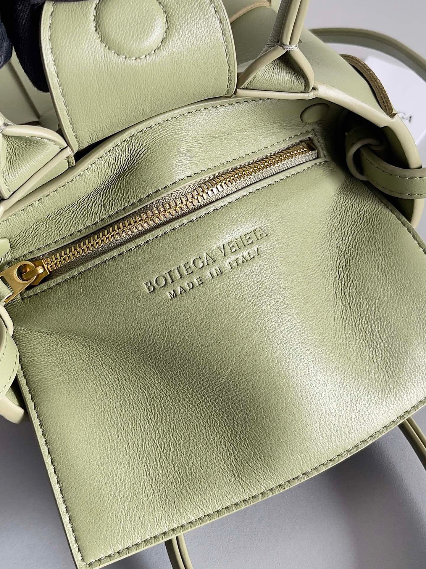 bo*te*ga Ve*ne*ta mini cassette tote bag in travertine lambskin