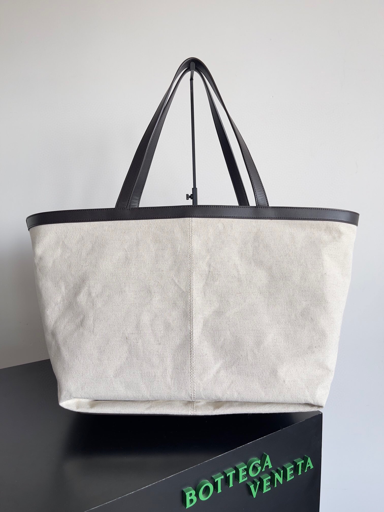 bo*te*ga Ve*ne*ta large flip flap bag in canvas with fondant leather