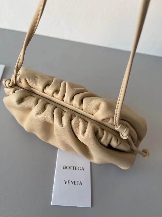 bo*te*ga Ve*ne*ta mini pouch in beige calfskin