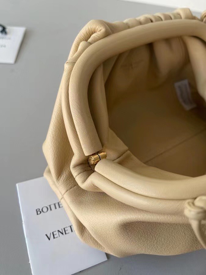 bo*te*ga Ve*ne*ta mini pouch in beige calfskin