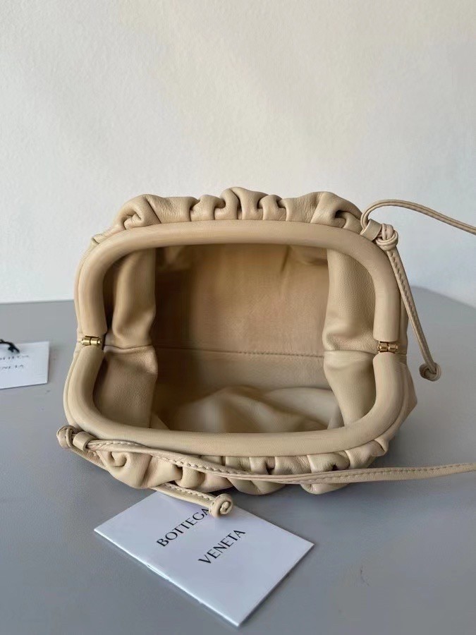 bo*te*ga Ve*ne*ta mini pouch in beige calfskin