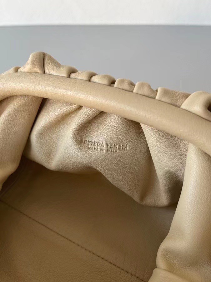 bo*te*ga Ve*ne*ta mini pouch in beige calfskin