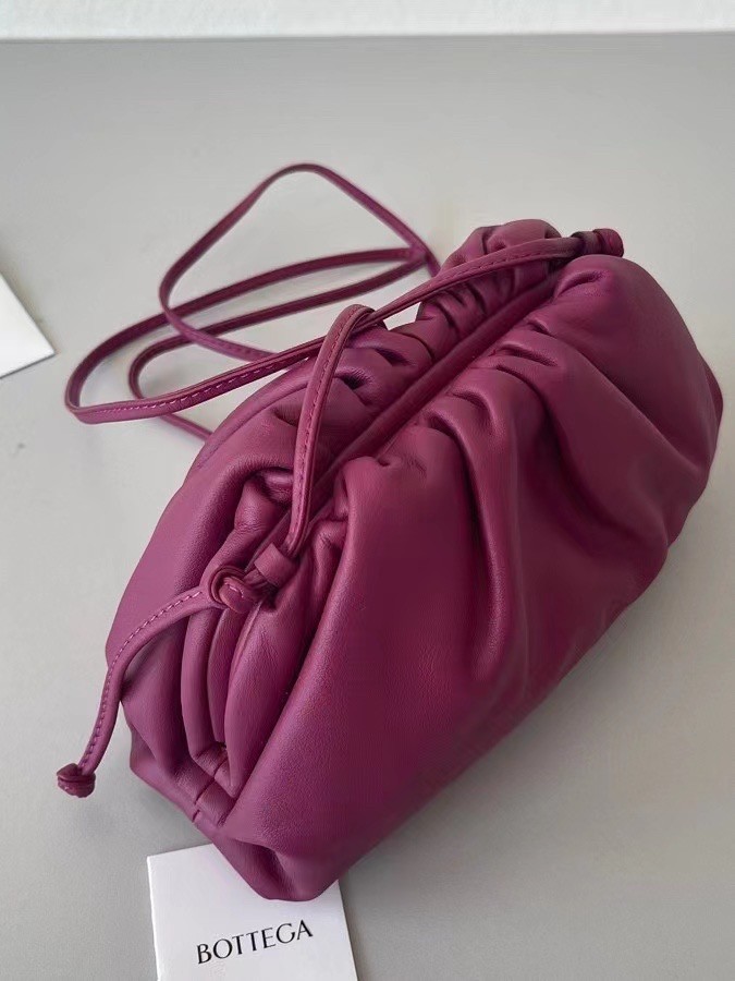 bo*te*ga Ve*ne*ta mini pouch in cinnabar calfskin