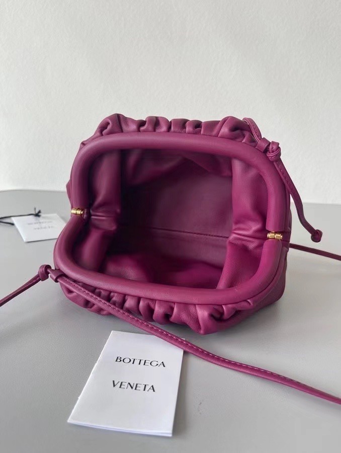 bo*te*ga Ve*ne*ta mini pouch in cinnabar calfskin
