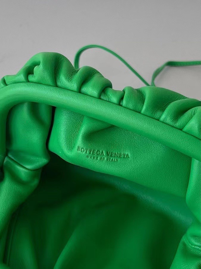 bo*te*ga Ve*ne*ta mini pouch in green calfskin