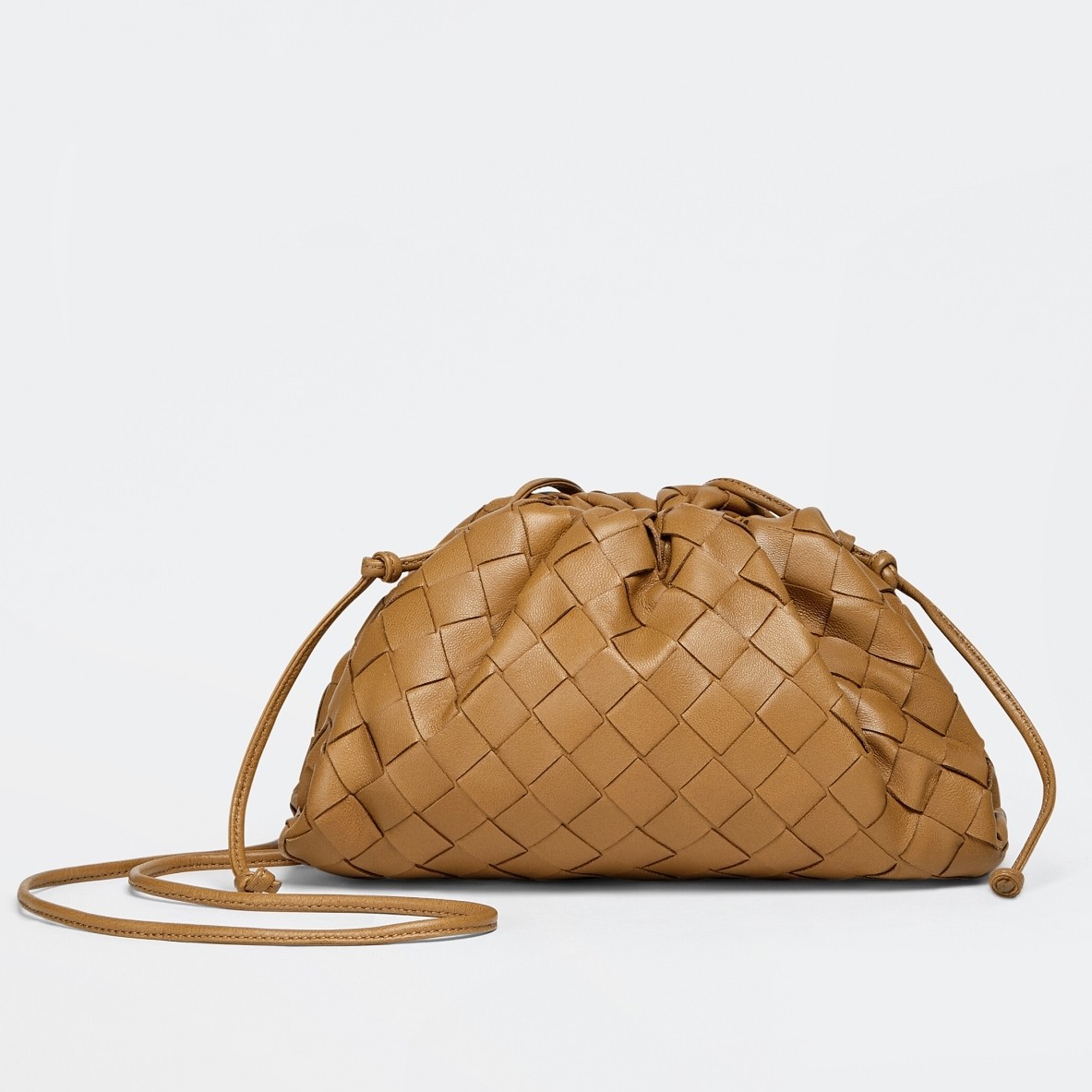 bo*te*ga Ve*ne*ta mini pouch in caramel intrecciato lambskin