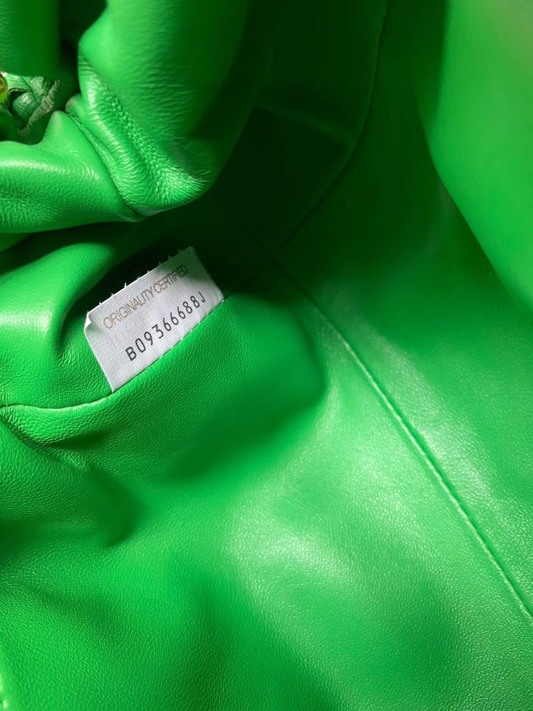 bo*te*ga Ve*ne*ta mini pouch in green intrecciato lambskin
