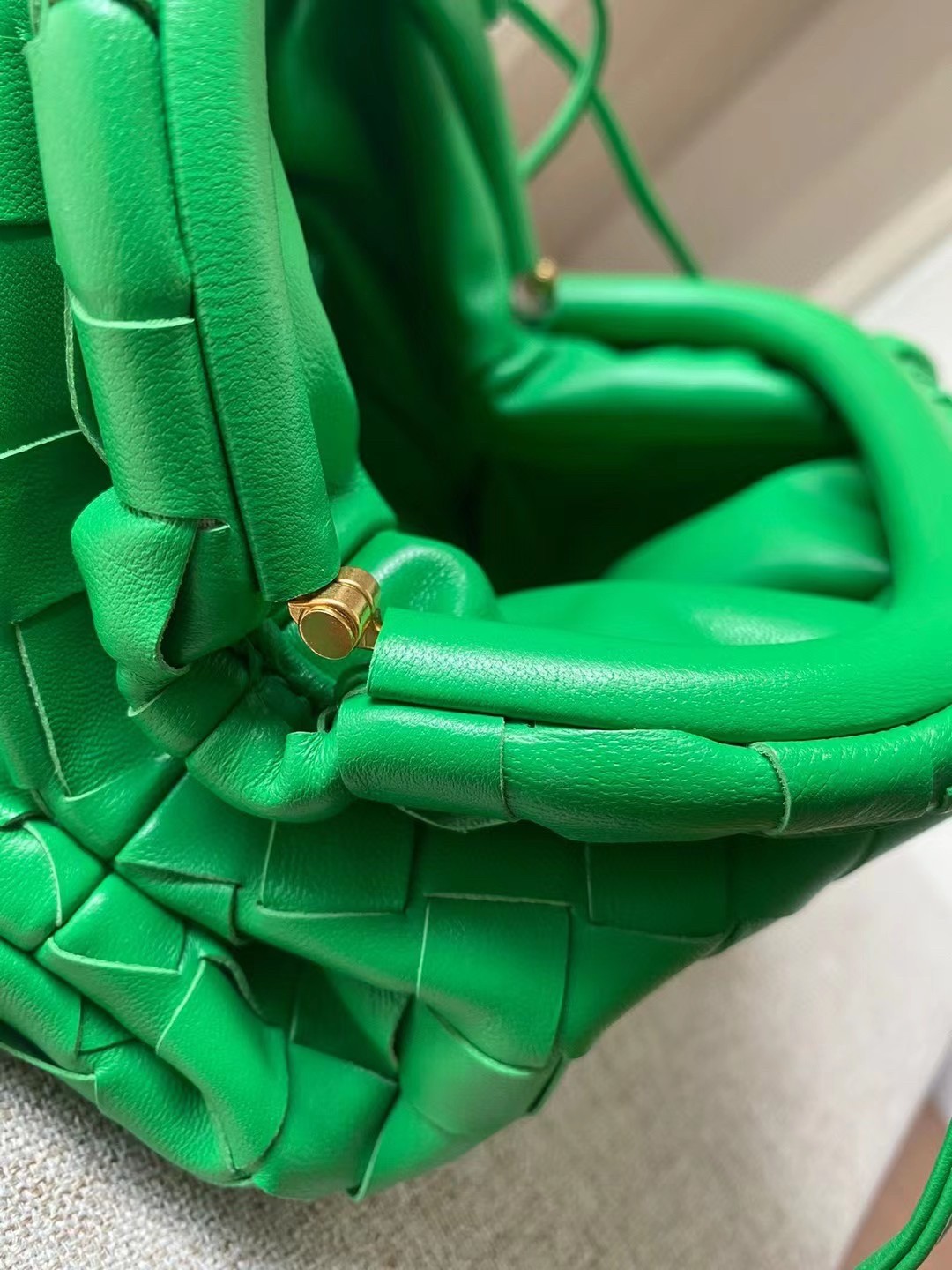 bo*te*ga Ve*ne*ta mini pouch in green intrecciato lambskin