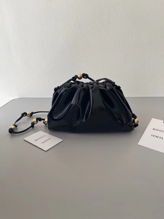bo*te*ga Ve*ne*ta mini pouch in black patent leather