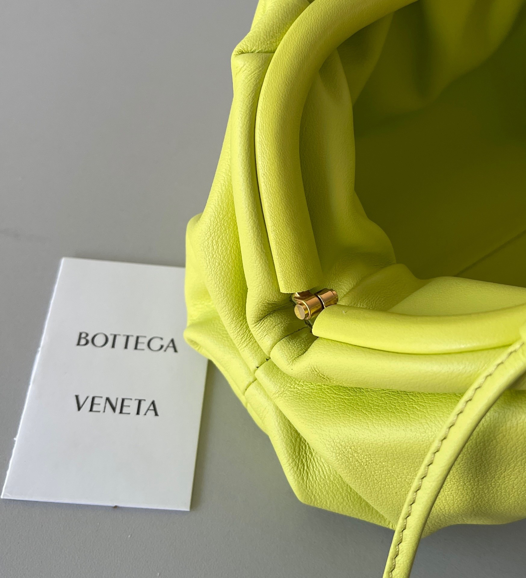 bo*te*ga Ve*ne*ta mini pouch bag in kiwi calfskin