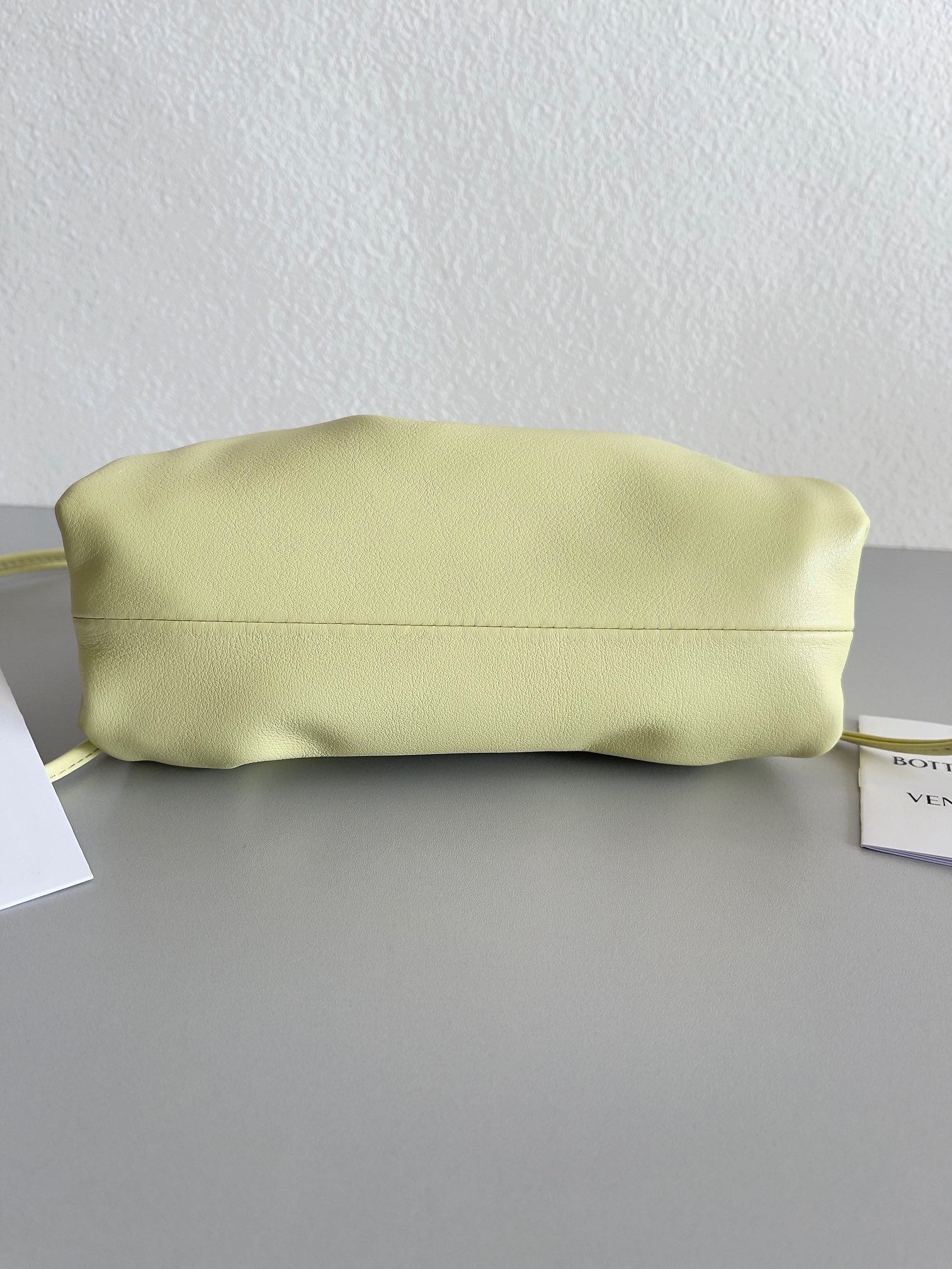 bo*te*ga Ve*ne*ta mini pouch bag in zest washed calfskin