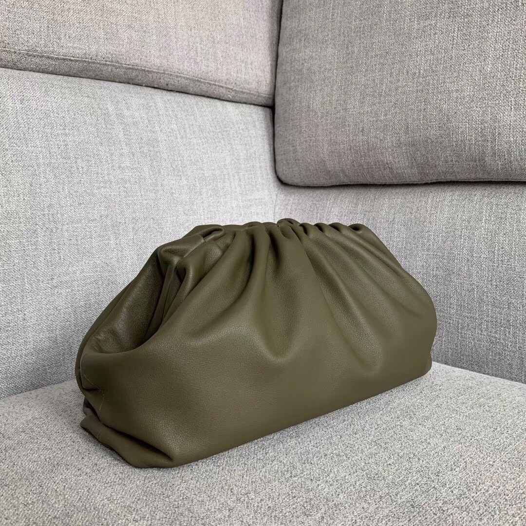 bo*te*ga Ve*ne*ta the pouch clutch in mustard calfskin