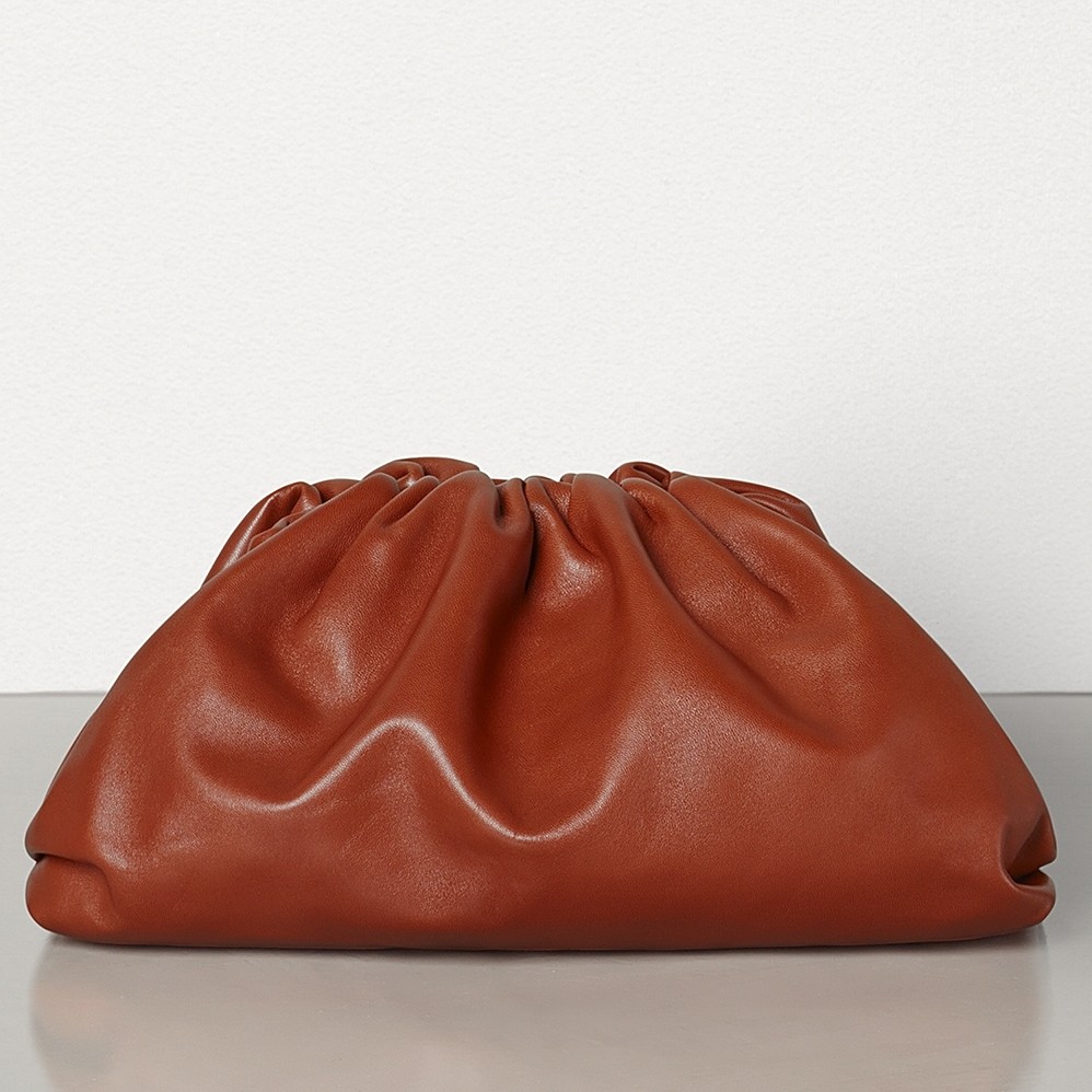 bo*te*ga Ve*ne*ta the pouch clutch in rust calfskin