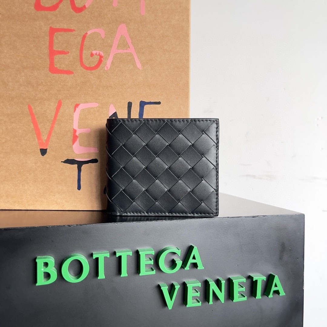 bo*te*ga Ve*ne*ta bi-fold wallet in black intrecciato calfskin