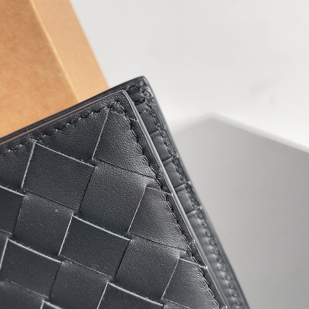 bo*te*ga Ve*ne*ta bi-fold wallet in black intrecciato calfskin