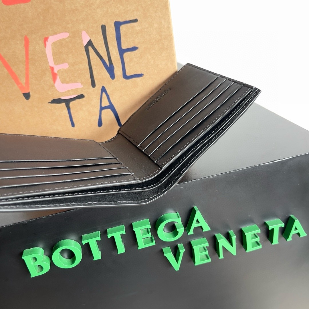 bo*te*ga Ve*ne*ta bi-fold wallet in black intrecciato calfskin