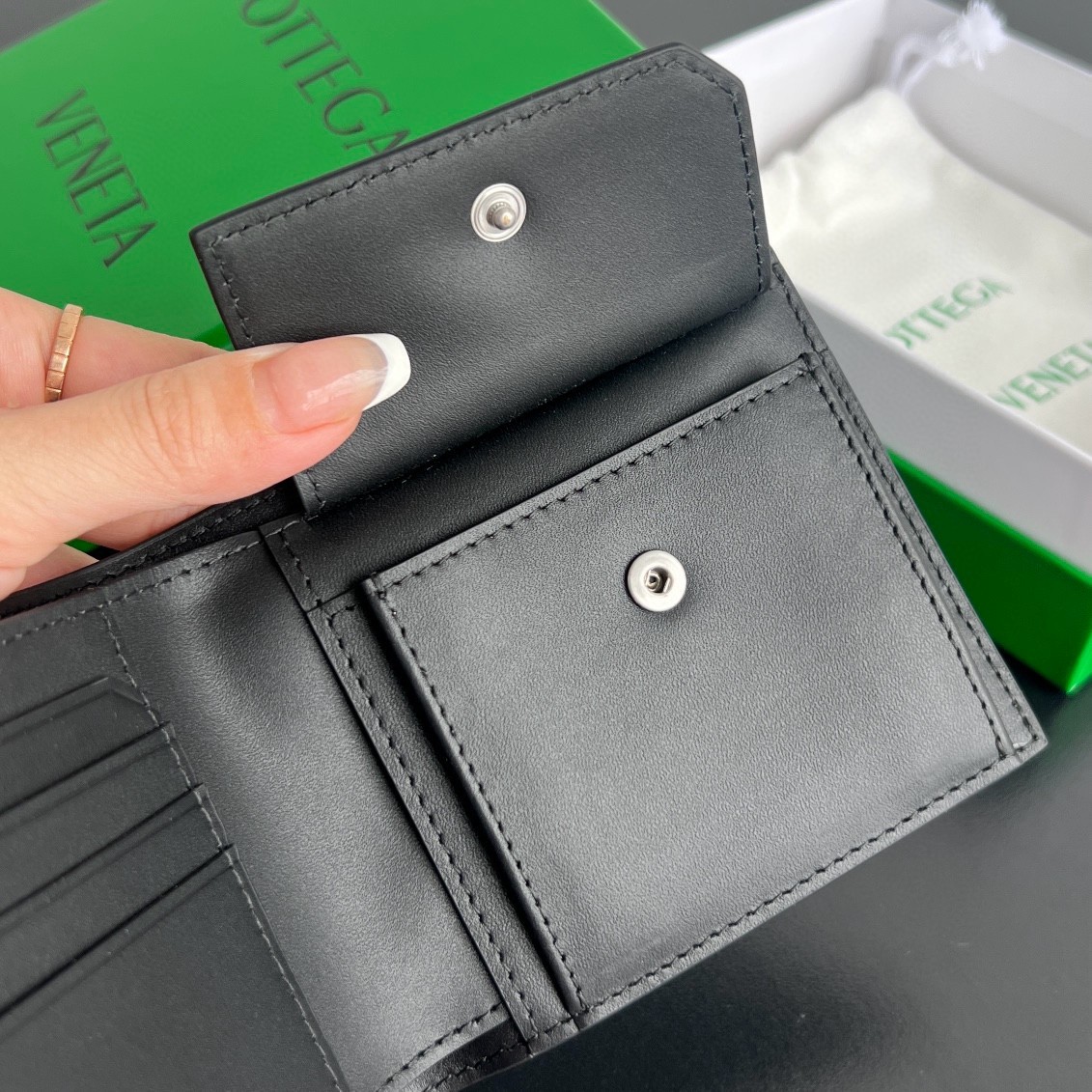 bo*te*ga Ve*ne*ta bi-fold wallet with coin purse in black intrecciato calfskin
