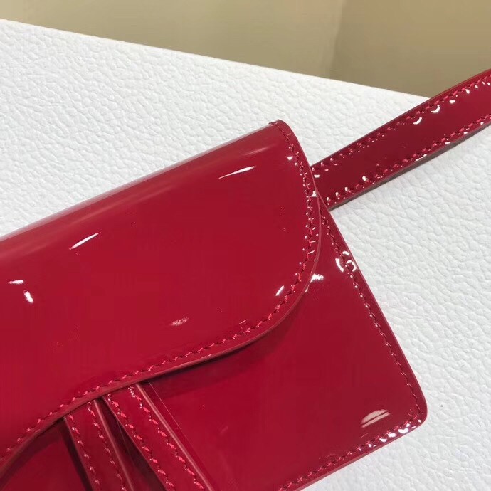 D*or saddle belt bag in red patent leather