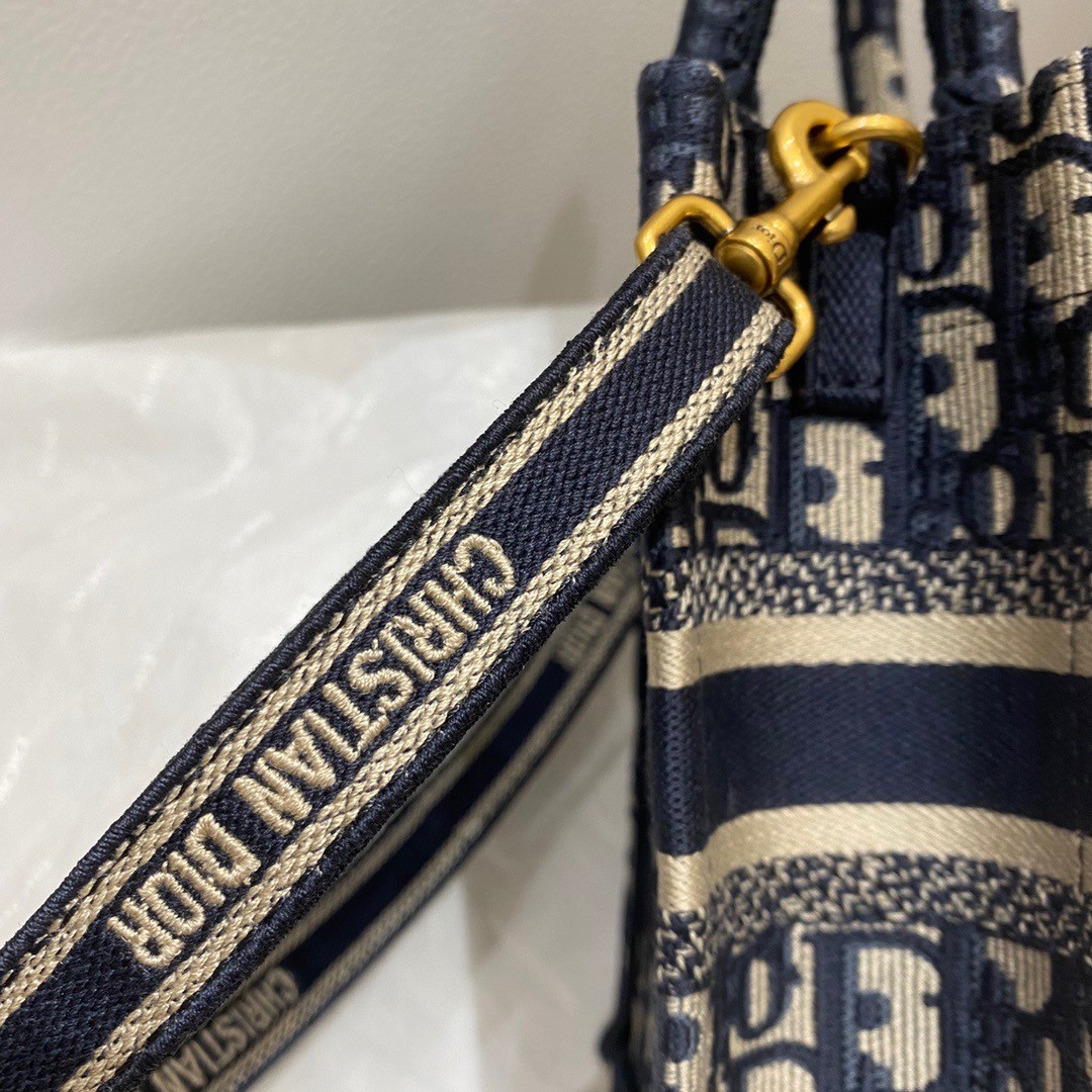 D*or mini book tote phone bag in blue D*or oblique embroidery