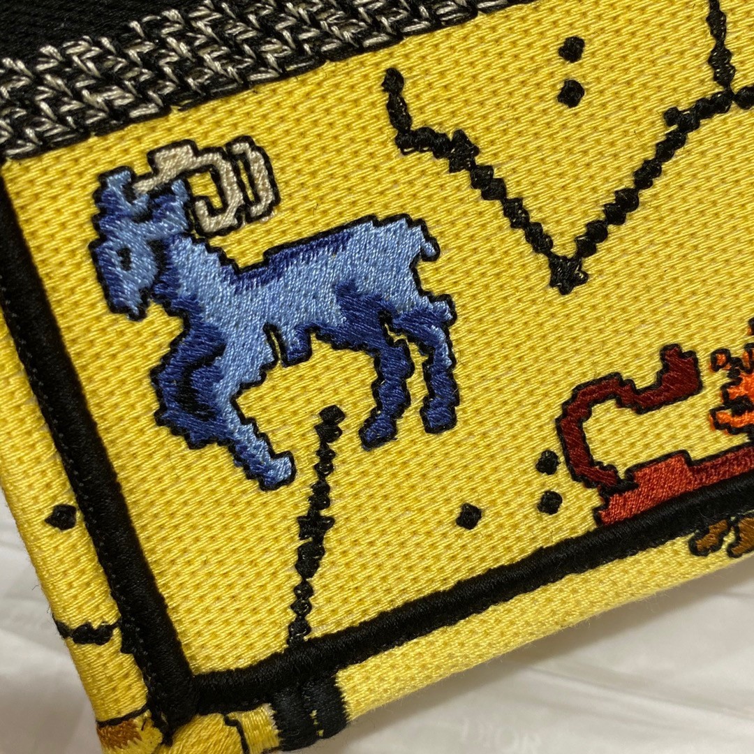 D*or mini book tote phone bag in yellow pixel zodiac embroidery