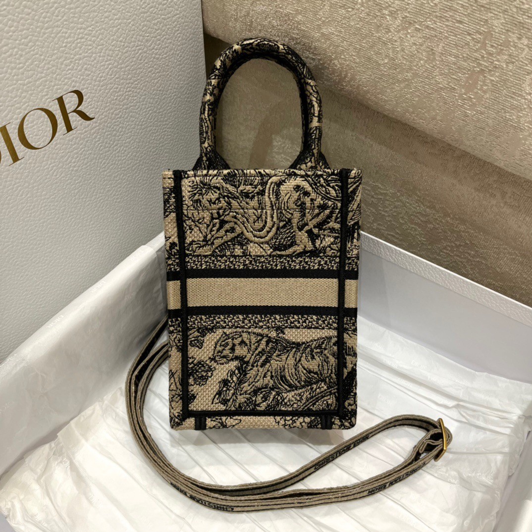 D*or mini book tote phone bag in hazelnut toile de jouy embroidery