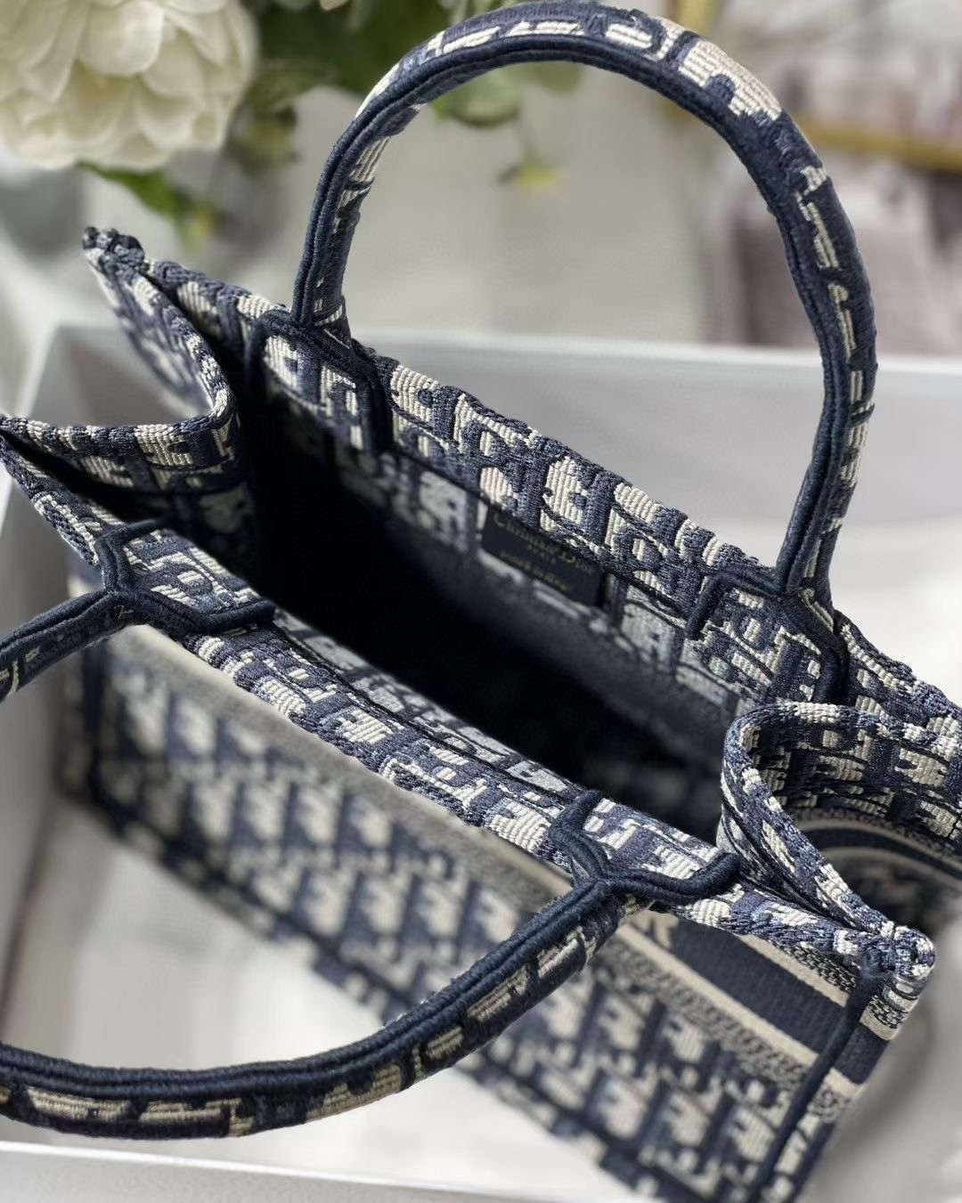 D*or new small book tote in blue D*or oblique jacquard