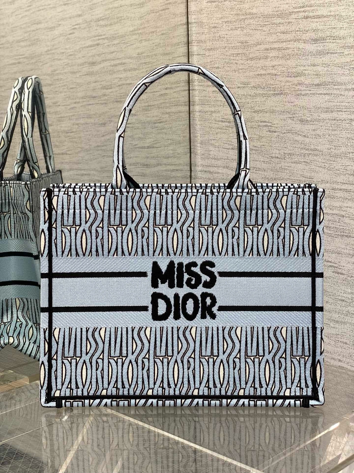 D*or medium book tote bag in blue miss D*or allover embroidery