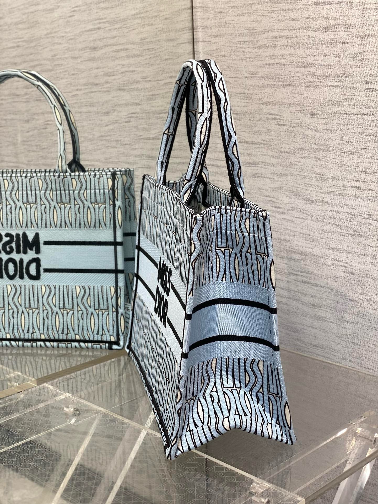 D*or medium book tote bag in blue miss D*or allover embroidery