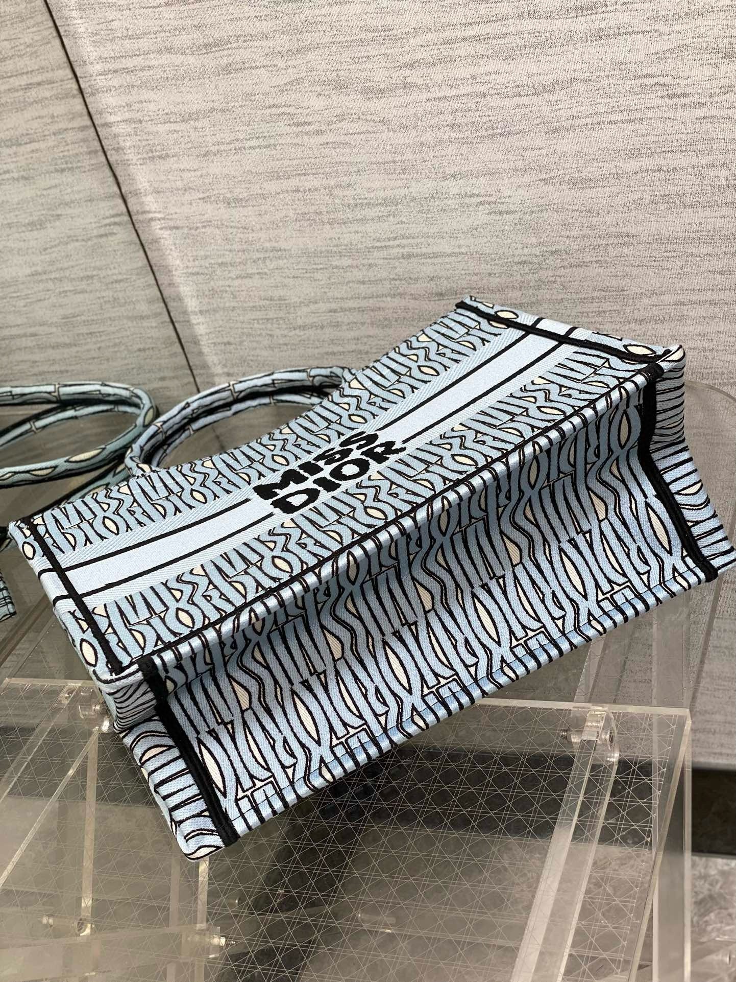 D*or medium book tote bag in blue miss D*or allover embroidery
